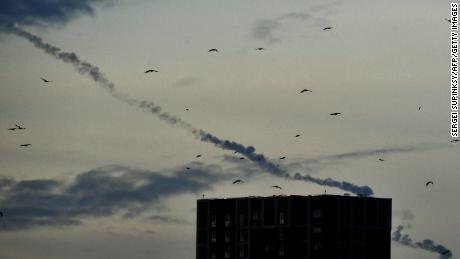 Missiles contrails seen in the sky over Kyiv amid a wave of Russian attacks.
