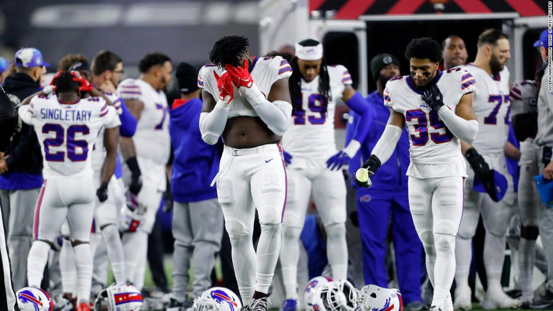 Buffalo Bills players react after teammate &lt;a href=&quot;http://www.cnn.com/2023/01/02/football/damar-hamlin-buffalo-bills-collapse/index.html&quot; target=&quot;_blank&quot;&gt;Damar Hamlin&lt;/a&gt; collapsed on the field during the first quarter of the Monday Night Football game against the Cincinnati Bengals. Hamlin was administered CPR before being transported off the field in an ambulance.