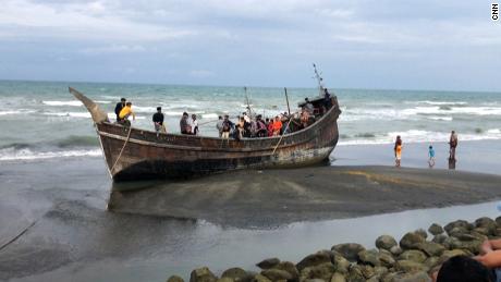 The rickety wooden boat that carried Hatemon Nesa and her daughter, Umme Salima pictured in  Aceh province, Indonesia.