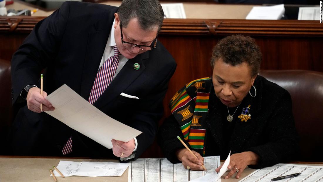 US Reps. Joe Morelle, a Democrat from New York, and Rep. Barbara Lee, a Democrat from California, look at the count after the first round of voting.