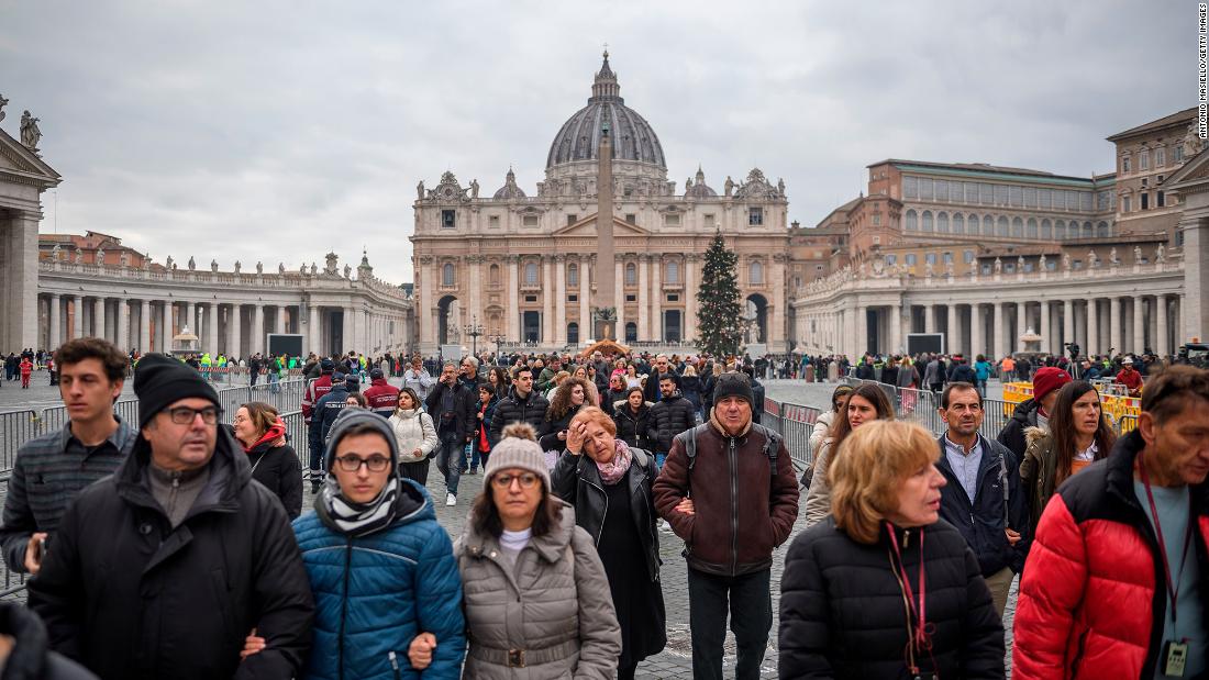 Mourners leave St. Peter&#39;s Square after paying their respects to Benedict on Monday.