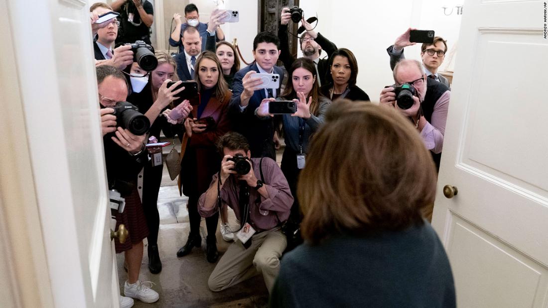 Pelosi, seen in the foreground, talks to reporters as she arrives at the Capitol on Wednesday. Pelosi told CNN that &lt;a href=&quot;https://www.cnn.com/politics/live-news/house-speaker-leadership-vote-1-4-23/h_96c351092e6346e420fc760e2c9ec32f&quot; target=&quot;_blank&quot;&gt;House of Representatives members should be sworn in&lt;/a&gt; — even if a speaker is not chosen yet — so their families can witness the moment and not have to wait around the Capitol all day.