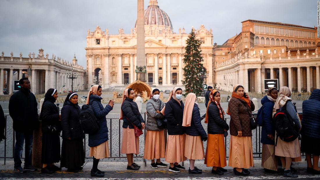 People line up to enter St. Peter&#39;s Basilica on Monday.