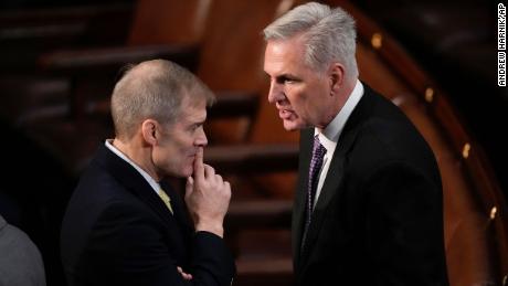 Rep. Jim Jordan talks with  McCarthy in the House chamber as the House meets on January 4, 2023, to elect a speaker.