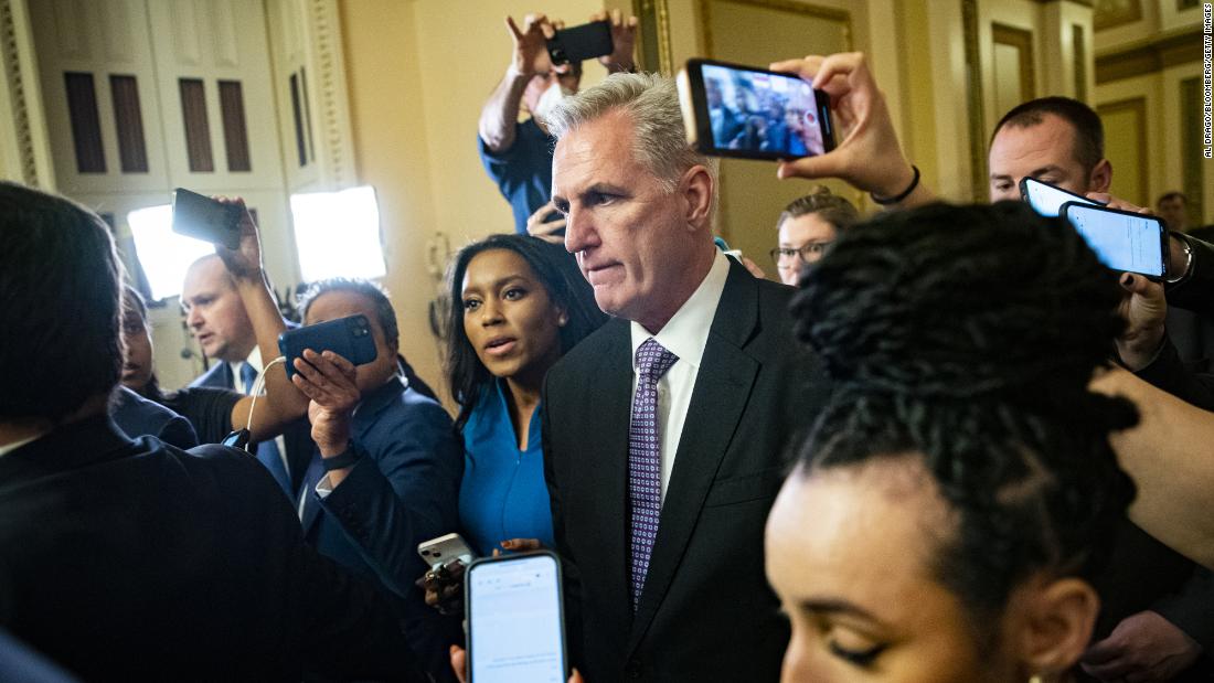 McCarthy speaks with members of the media as he leaves the House chamber on Wednesday.