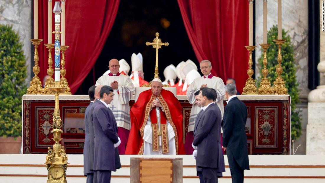 Pallbearers stand next to the coffin of former Pope Benedict as Pope Francis presides over the ceremonies, in St. Peter&#39;s Square at the Vatican, on January 5.