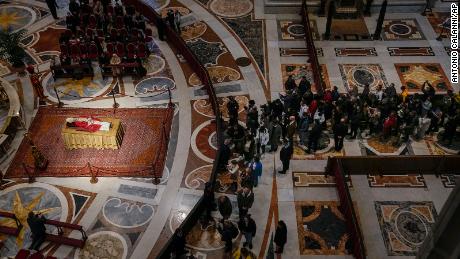 People queue to see off late Pope Emeritus Benedict XVI lying out in state inside St. Peter&#39;s Basilica at The Vatican where thousands went to pay their homage Tuesday, Jan 3, 2023. 