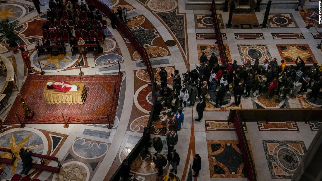 Mourners at the Vatican pay their respects to former Pope Benedict XVI as he lies in state inside St. Peter&#39;s Basilica on Tuesday, January 3.