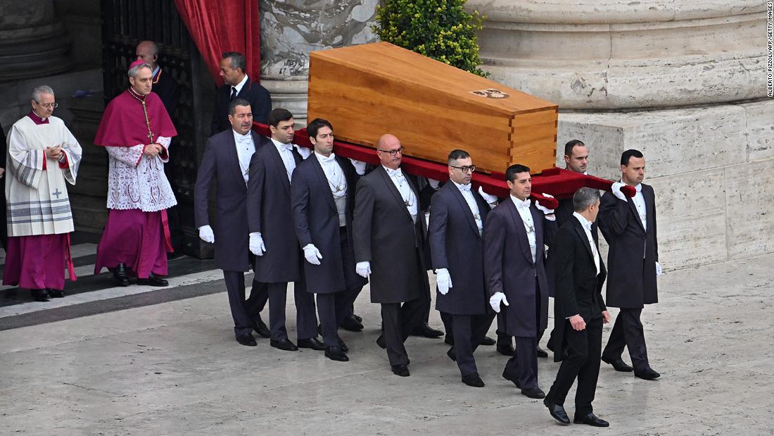 Pallbearers carry the coffin of Pope Emeritus Benedict XVI at the start of his funeral mass at St. Peter&#39;s Square in the Vatican, on January 5.