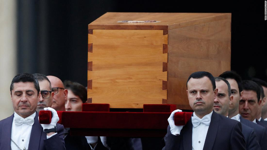 The coffin of former Pope Benedict is carried during his funeral, in St. Peter&#39;s Square at the Vatican.