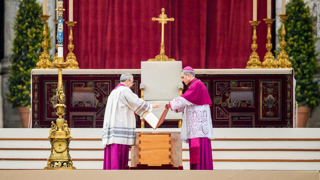German Archbishop Georg Gänswein (R) stands by the coffin of the late Pope Emeritus Benedict XVI at the start of his funeral mass at St. Peter&#39;s Square.