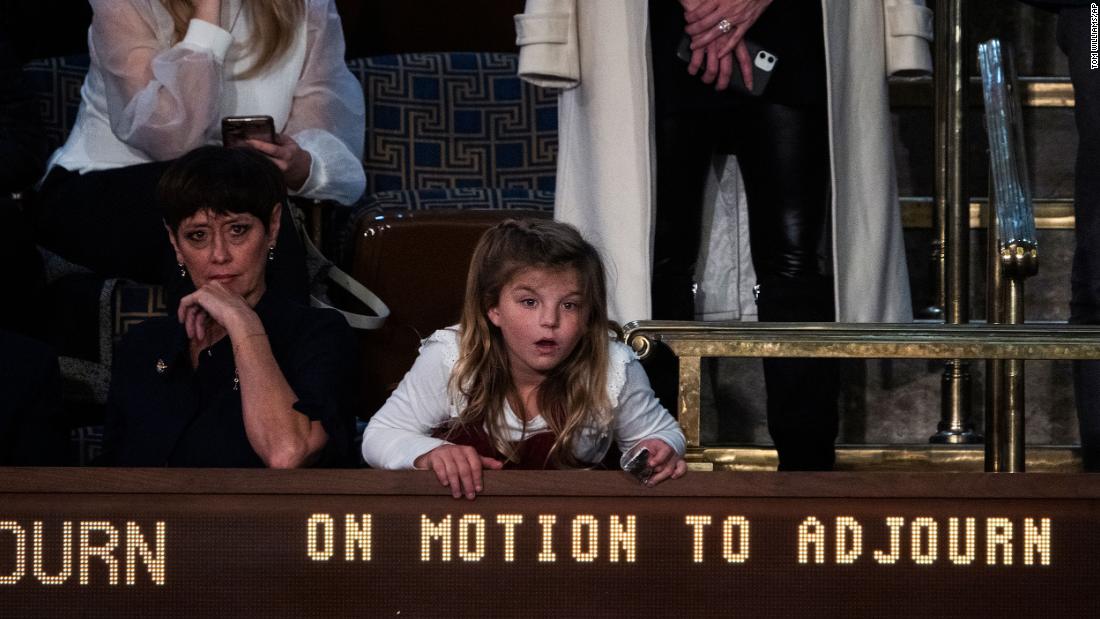 A girl in the House chamber watches a motion to adjourn vote that failed Friday night.