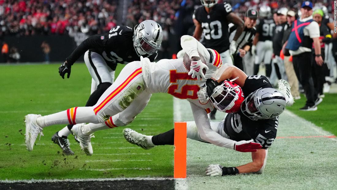 Kansas City Chiefs wide receiver Kadarius Toney catches a touchdown against Las Vegas Raiders linebacker Luke Masterson during the fourth quarter at Allegiant Stadium. With the emphatic 31-13 victory, the Chiefs clinched the No. 1 seed in the AFC and a bye for the first round of the playoffs. 