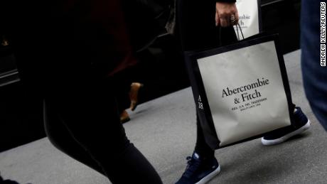 A person carries a bag from the Abercrombie &amp; Fitch store on Fifth Avenue in Manhattan, New York City, U.S., February 27, 2017. 