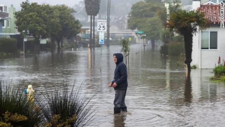 Thousands of Californians under evacuation orders as flood threats continue and death toll of recent storms climbs to 17