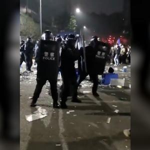 Videos censored in China show standoff between police and factory workers