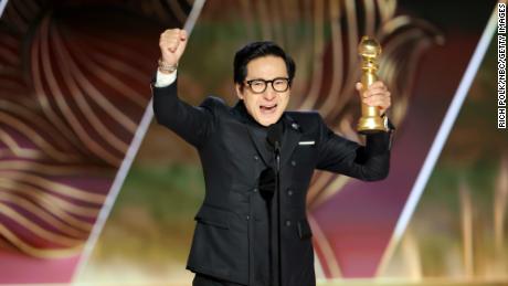 Ke Huy Quan accepts the best supporting actor in a motion picture award for &quot;Everything Everywhere All at Once&quot; onstage at the 80th Annual Golden Globe Awards. 