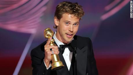 Austin Butler accepts the best actor in a drama motion picture award for &quot;Elvis&quot; at the 80th Golden Globe Awards. 