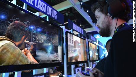 A fan tries &quot;The Last Of Us&quot; at the E3 Gaming and Technology Conference in June 2013.