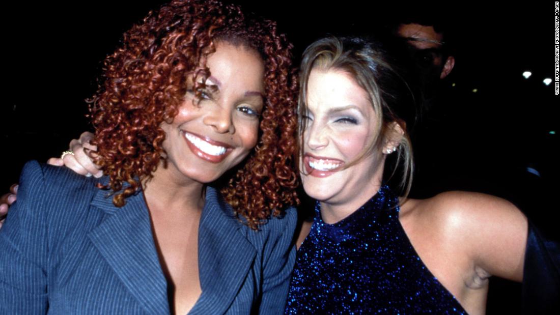 Presley joins Janet Jackson at a New York party to celebrate the release of Jackson&#39;s 1997 album, &quot;The Velvet Rope.&quot;