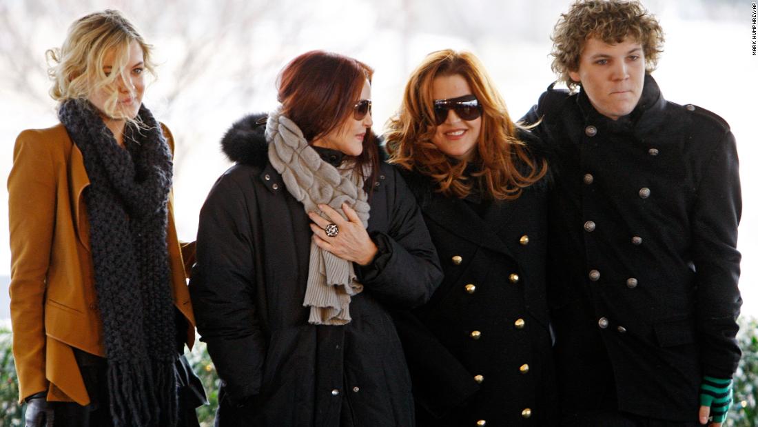 From left, Riley Keough, Priscilla Presley, Lisa Marie Presley and Benjamin Keough take part in a ceremony commemorating Elvis&#39; 75th birthday in 2010.