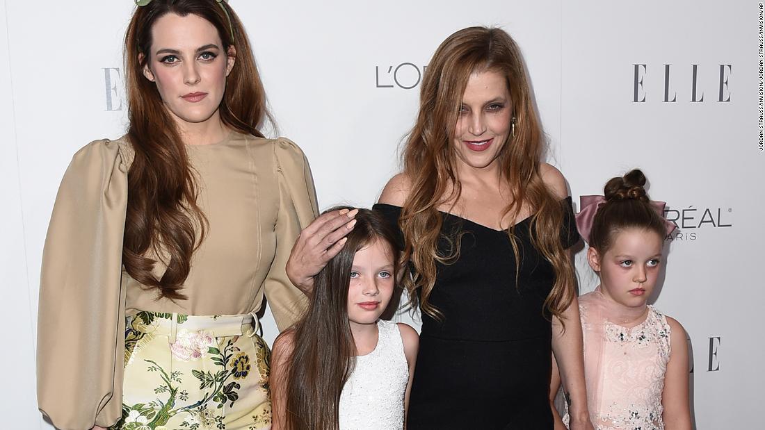 Presley, second from right, arrives for the 2017 Elle Women in Hollywood Awards with her daughter Riley Keough, left, and her twin daughters, Finley and Harper Lockwood.