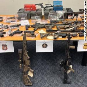 Man arrested after machine gun and illegal firearms found in his home, police say