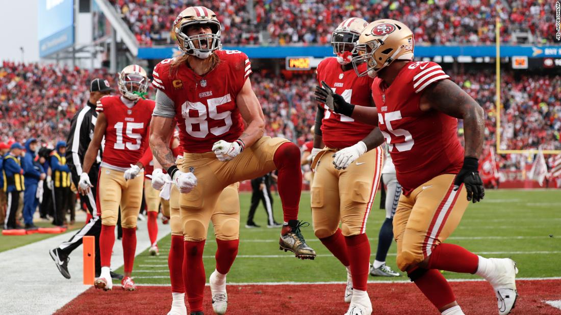 San Francisco 49ers tight end George Kittle celebrates after scoring a two-point conversion against the Seattle Seahawks. The 49ers used a big second half to break away from a plucky Seahawks squad and win 41-23. It continues the remarkable run of rookie 49ers quarterback Brock Purdy -- who threw for three touchdowns -- who was drafted with the final pick of last year&#39;s NFL draft. 
