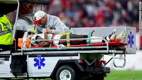 Russell Gage, #17 of the Tampa Bay Buccaneers, is carted off the field after suffering an injury during the fourth quarter in the NFC Wild Card playoff game at Raymond James Stadium Monday in Tampa, Florida. 