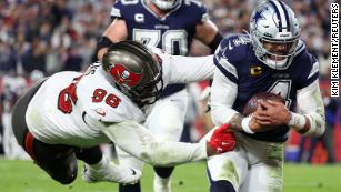 Tampa Bay Buccaneers wide receiver Mike Evans (13) stiff-arms Seattle  Seahawks safety Quandre Diggs (6) during an NFL football game on Nov. 13,  2022, in Munich. The Buccaneers defeated the Seahawks 21-16. (