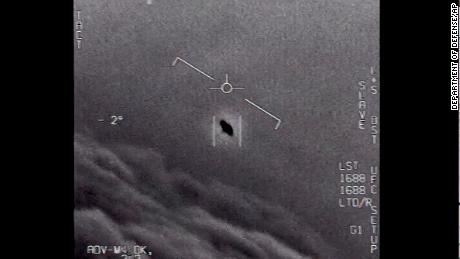 The image from video provided by the Department of Defense labelled Gimbal, from 2015, an unexplained object is seen at center as it is tracked as it soars high along the clouds, traveling against the wind. &quot;There&#39;s a whole fleet of them,&quot; one naval aviator tells another, though only one indistinct object is shown. &quot;It&#39;s rotating.&quot; The U.S. government has been taking a hard look at unidentified flying objects, under orders from Congress, and a report summarizing what officials know is expected to come out in June 2021. (Department of Defense via AP)