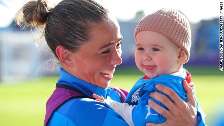 Gunnarsdóttir embraces her son while on national duty with Iceland in 2022.