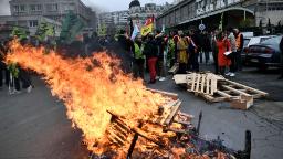 Striking French workers lead 1 million people in protest over plans to raise retirement age