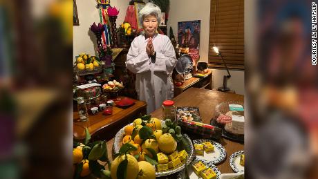 Le Ly Hayslip honors her ancestors as part of Tết at her home in San Diego.