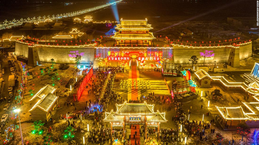 People visit a lantern show at a tourist attraction on Tuesday, January 17, ahead of the Lunar New Year in Yuncheng, China.