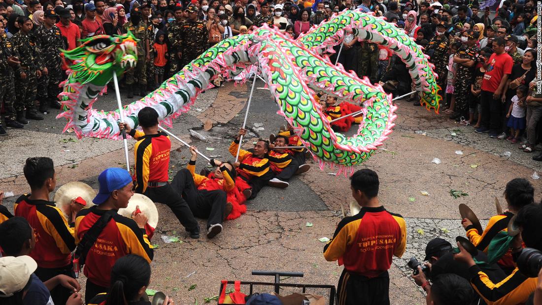 Residents take part in the Grebeg Sudiro festival ahead of Lunar New Year in Solo, Indonesia, on Sunday, January 15.
