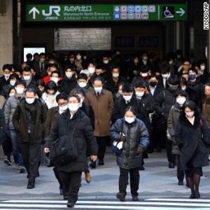 Japan considers downgrading Covid-19 to same level as seasonal flu