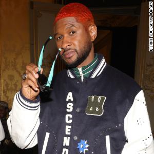 Usher shows off new look at Paris Fashion Week