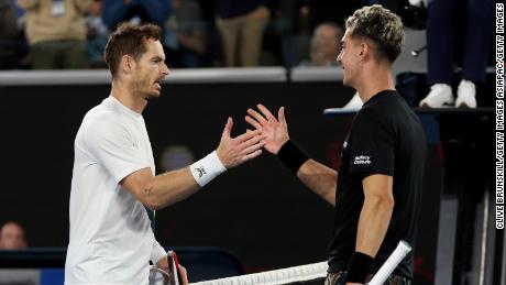 Murray (left) and Kokkinakis shake hands after their second-round match at the Australian Open. 