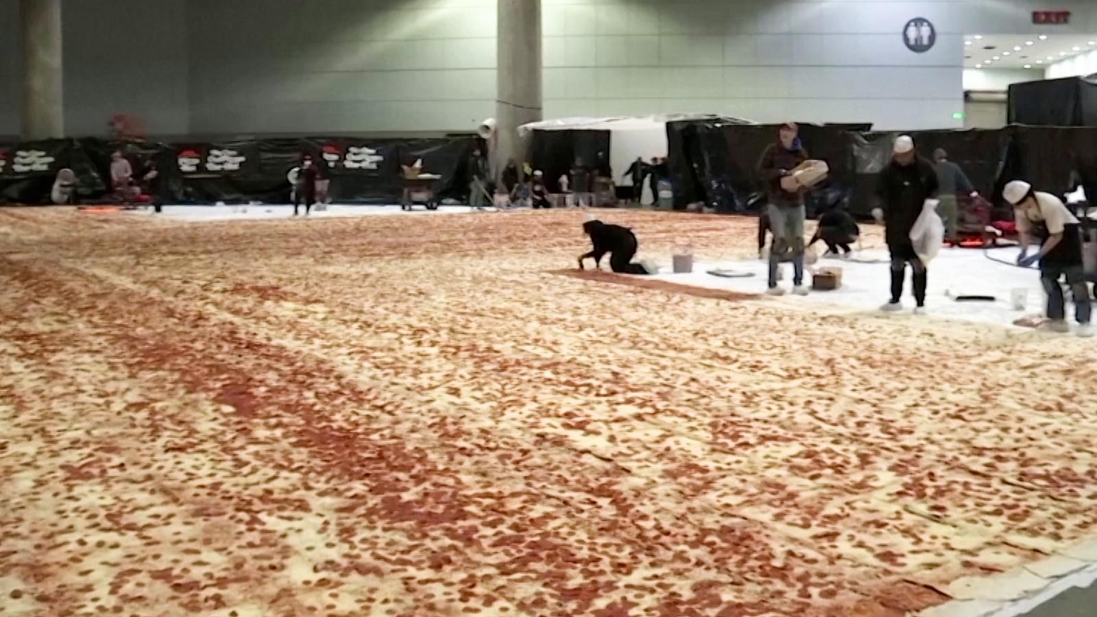 Pizza Hut Creates Massive Pepperoni Pizza, Breaks World Record - CNN Video