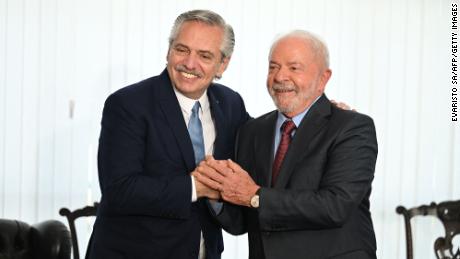 Brazil&#39;s President Luiz Inacio Lula da Silva poses for a picture with Argentina&#39;s President Alberto Fernandez during a bilateral meeting in Brasilia on Jan. 2, 2023.