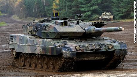 A Leopard 2 A7 main battle tank of the German armed forces Bundeswehr drives through the mud in the context of an informative educational practice &quot;Land Operation Exercise 2017&quot; at the military training area in Munster, northern Germany, on October 13, 2017. / AFP PHOTO / PATRIK STOLLARZ        (Photo credit should read PATRIK STOLLARZ/AFP via Getty Images)
