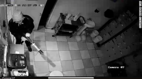Security footage from teh Lai Lai Ballroom shows the suspect entering a door. 