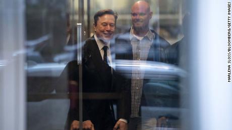 Elon Musk, chief executive officer of Tesla Inc., left, arrives at court in San Francisco, California, US, on Tuesday, Jan. 24, 2023. Investors suing Tesla and Musk argue that his August 2018 tweets about taking Tesla private with funding secured were indisputably false and cost them billions of dollars by spurring wild swings in Tesla&#39;s stock price. 
