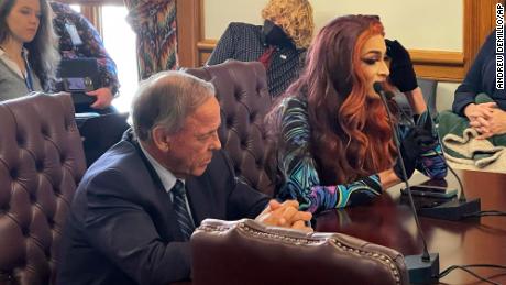 Drag performer MD Hunter, whose stage name is Athena Sinclair, testifies before a state Senate panel as state Sen. Gary Stubblefield, left, listens, at the Arkansas Capitol in Little Rock, Arkansas, on Thursday, January 19, 2023.  