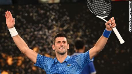 Novak Djokovic celebrates winning against Tommy Paul in their semifinal at the Australian Open.