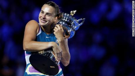 Belarus&#39; Aryna Sabalenka poses with the trophy after winning against Kazakhstan&#39;s Elena Rybakina during the women&#39;s singles final on day thirteen of the Australian Open tennis tournament in Melbourne on January 28, 2023.