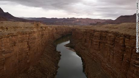 MARBLE CANYON, ARIZONA - JANUARY 1: Seen from atop the Historic Navajo Bridge the Colorado River flows toward Lees Ferry the only place within Glen Canyon where people are able to easily access the Colorado River from both sides in over 700 miles of Glen Canyon country on January 1, 2023 in Marble Canyon, Arizona. (Photo by RJ Sangosti/MediaNews Group/The Denver Post via Getty Images)