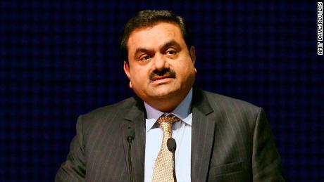 Adani Group Chairman and founder Gautam Adani addresses a gathering during the concluding ceremony of the Vibrant Gujarat Summit in Gandhinagar in the western Indian state of Gujarat January 12, 2015. 