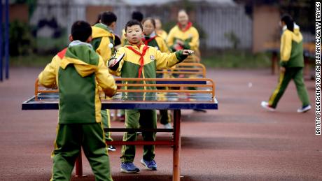 Students play table tennis in Dujiangyan, Sichuan province, China on December 8, 2018.